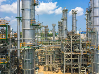 Fototapeta na wymiar The equipment of oil refining in process area ,Close up of industrial pipelines of an oil refinery plant