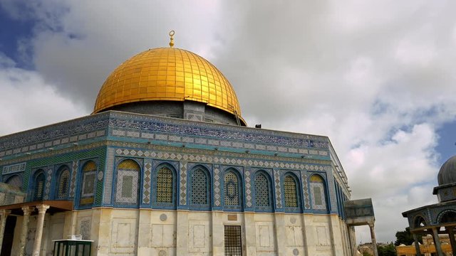 Clouds over Dome of the Rock in Jerusalem over the Temple Mount. Golden Dome is the most known mosque and landmark in Jerusalem and sacred place for all muslims.