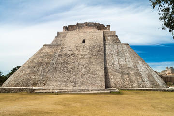 Pyramid of the Magician (Piramide del adivino) at the ruins of the ancient Mayan city Uxmal, Mexico