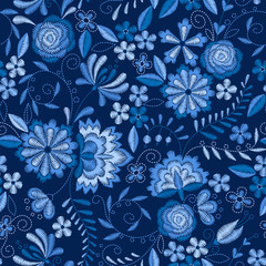Embroidery seamless pattern with beautiful flowers. Vector floral ornament on dark blue background. Embroidery for fashion textile and fabric.