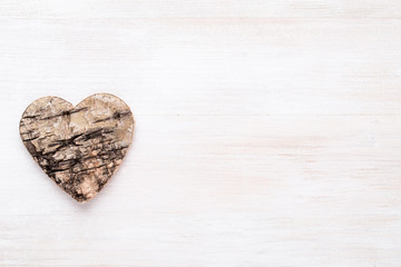Background with wooden hearts, place for text.