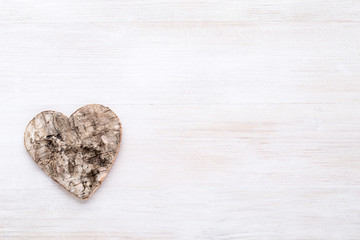 Background with wooden hearts, place for text.