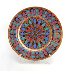 Tourist souvenirs in the form of plates with a classic pattern