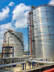 Oil and chemical large tank with blue sky
