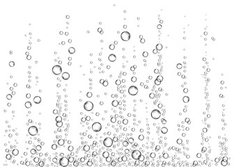 Naklejka na ściany i meble Underwater fizzing air bubbles on white background.