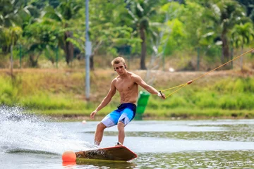 Fototapeten Extremsportarten Man Wakeboarding  © dima266f