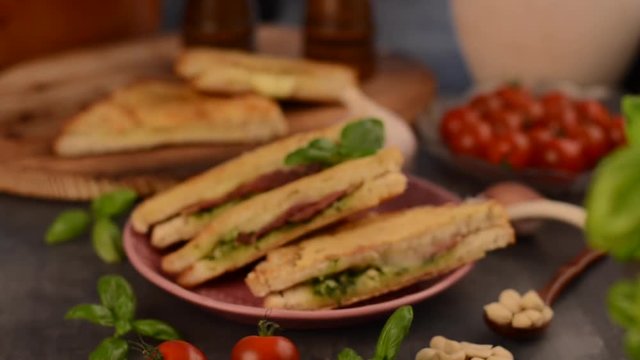 Pesto ham sandwich stock footage