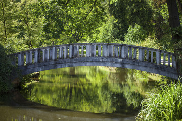 Old bridge in  a old romantic park