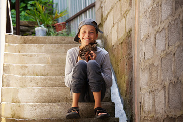 Happy teenager with kitten