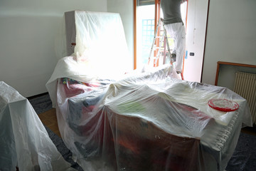 living room of the house during painting of the walls