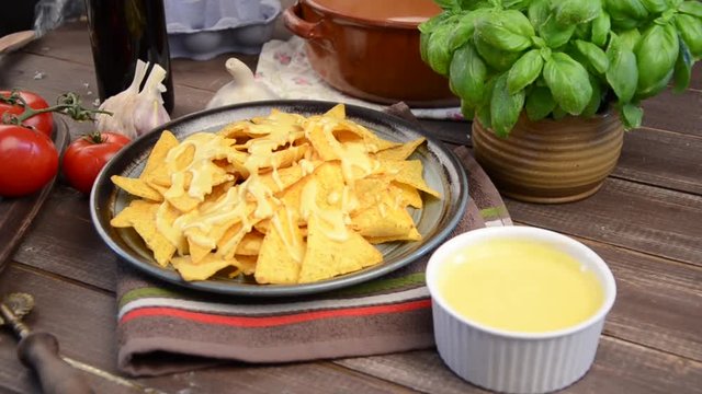 Nachos with chesse sauce, stock footage cooking show