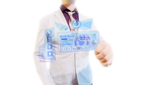 Man with a futuristic screen.  The concept of the future interface on a transparent display
