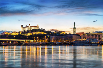 Fototapeta na wymiar Bratislava castle and st. Martin cathedral at evening, Slovakia, Europe
