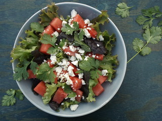 Watermelon salad with feta cheese and cilantro.