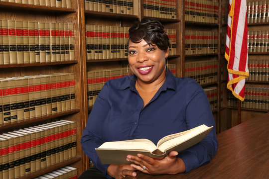 Portrait of an attractive African American woman, female attorney in law office