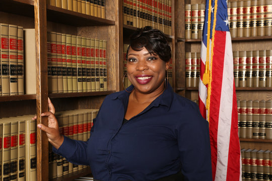 Portrait of an attractive African American woman, female attorney in law office