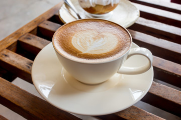 coffee latte cup and ice cream on restaurant table