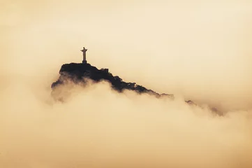 Poster Christ the Redeemer statue on the fog © Jorge