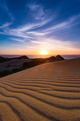 Fototapeta na wymiar Sand and Sunset
