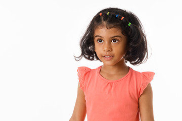 Cute little girl standing barefoot.Isolated.Studio shot