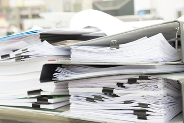 Stacks of paper in office