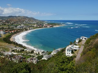 Fototapeta na wymiar Frigate Bay, St Kitts View of Frigate Bay coastal villages from the top 