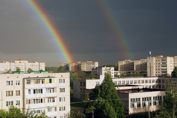 A double rainbow after the rain in the city