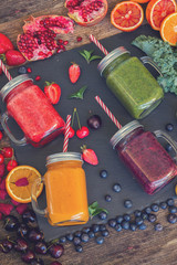 Fresh smoothie drink jars with igredients close up, retro toned