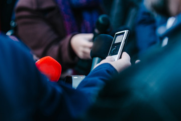 Interviewing businessman on press conference