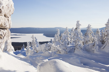 Mountain range Zuratkul, winter landscape. Snowdrifts near forest