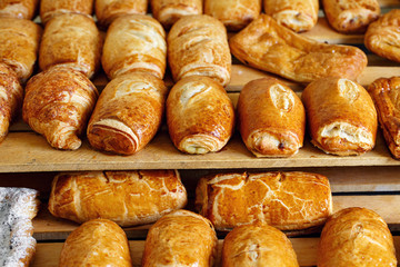Freshly baked bread and puffson tray.