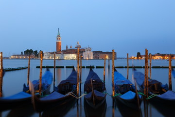 Gondolas and Chiesa di San Giorgio Maggiore, San Marco square in Venice, Italy © leochen66