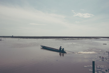 A fleet of long tail boat docking at lotus lake, Vintage tone.