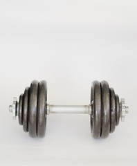 Naklejka premium Fitness equipment and accessories with dumbbells.Fitness concept.