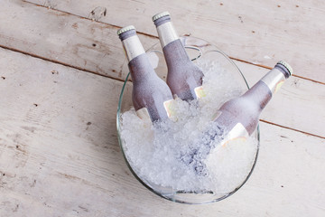 Frozen glass bottles of beer