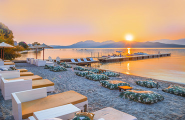 Obraz premium Beautiful sunrise over Nikiana beach in Lefkada island in summer season, Greece