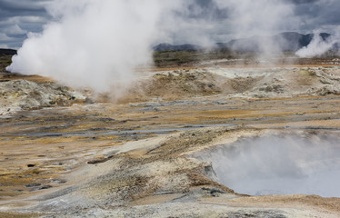 Steam Pits of Geothermal Landscape Hverarond on Iceland