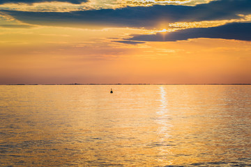 Beautiful orange sunset on the sea. Summer sunset landscape