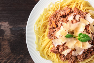 Pasta bolognese on rustic background with copyspace