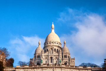Obraz premium The Basilica Sacre Couer in Paris, France on a mostly clear day