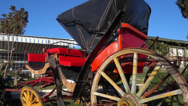 4K Zoom out and trekking shot of an old original carriage 