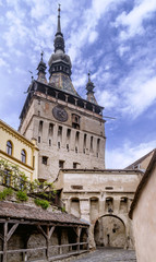 Fototapeta premium Beautiful vertical view of the famous tower Turnul cu Ceas, Citadel, Sighisoara, Romania