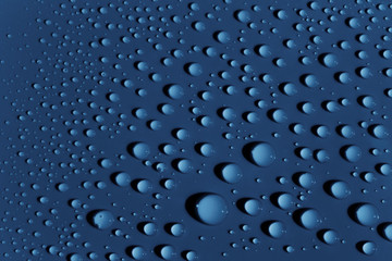Water drops on smooth surface in a rainy day