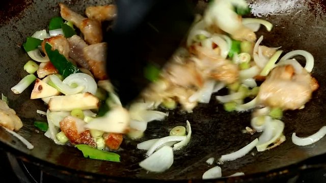 frying pork with hurb