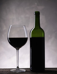 Red wine bottle and wine glass