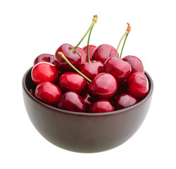 Cherries in a bowl isolated without shadow