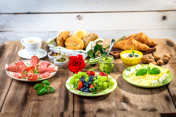 Breakfast served with fruit, croissants,cheese and sausage