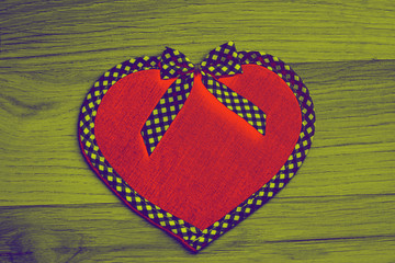 Red heart with a decorative bow - copy space, background