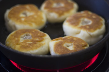 a pie with meat and onions