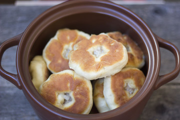 a pie with meat and onions